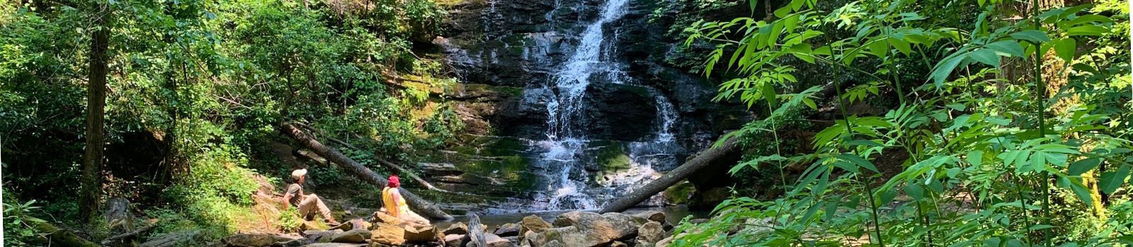 Waterfall and hikers near Long Creek